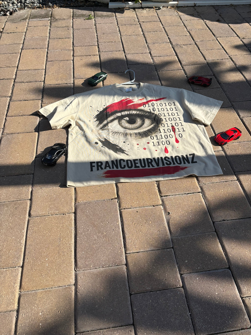 eyes don't lie beige tee