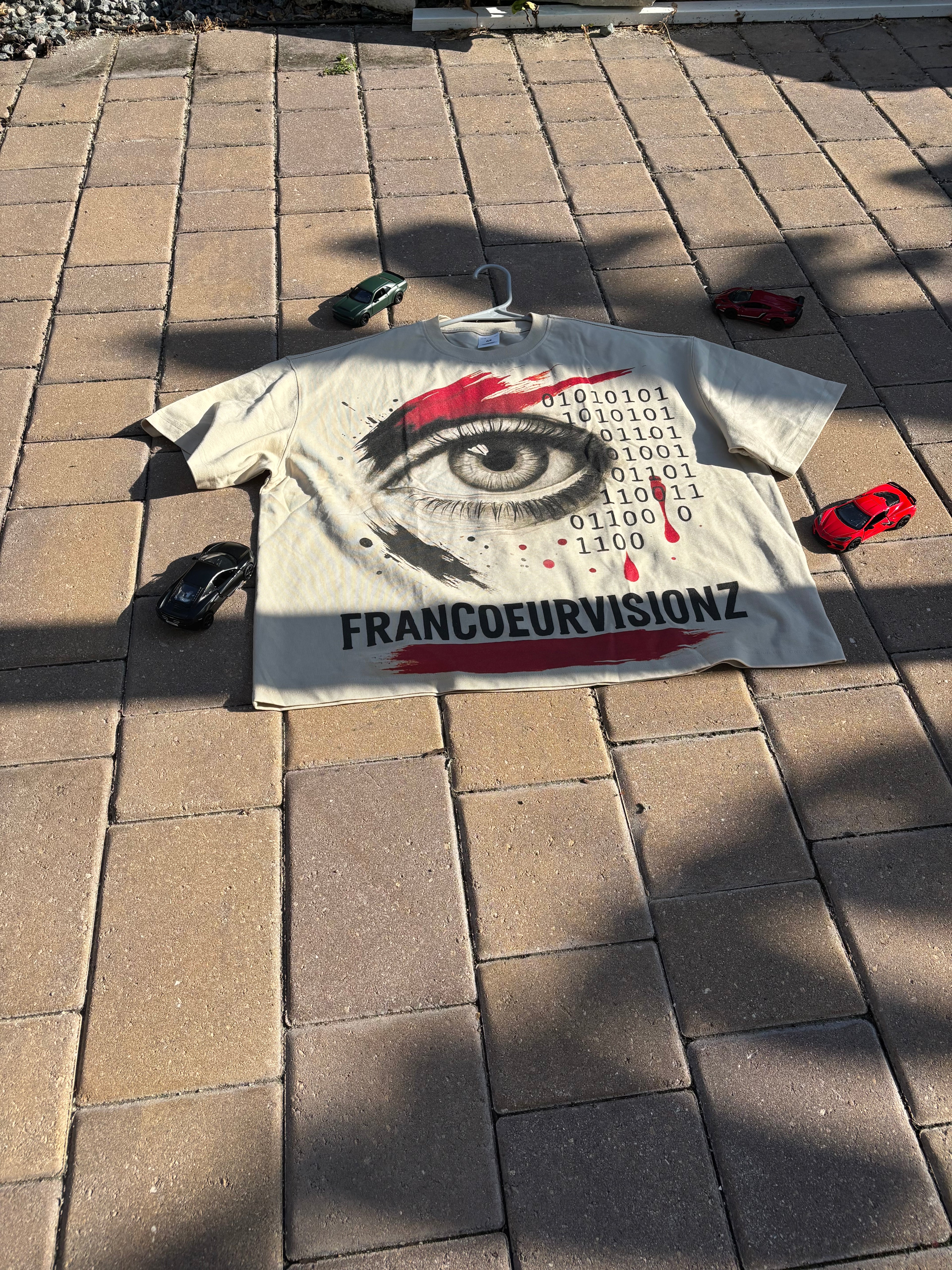 eyes don't lie beige tee